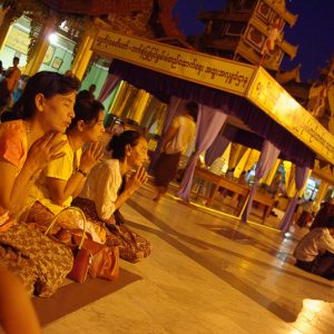 Praying moment at Shwedagon Myanmar - MagCarbone photo